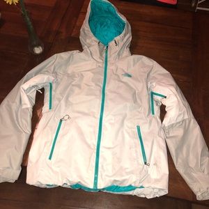 Grey north face jacket with teal interior